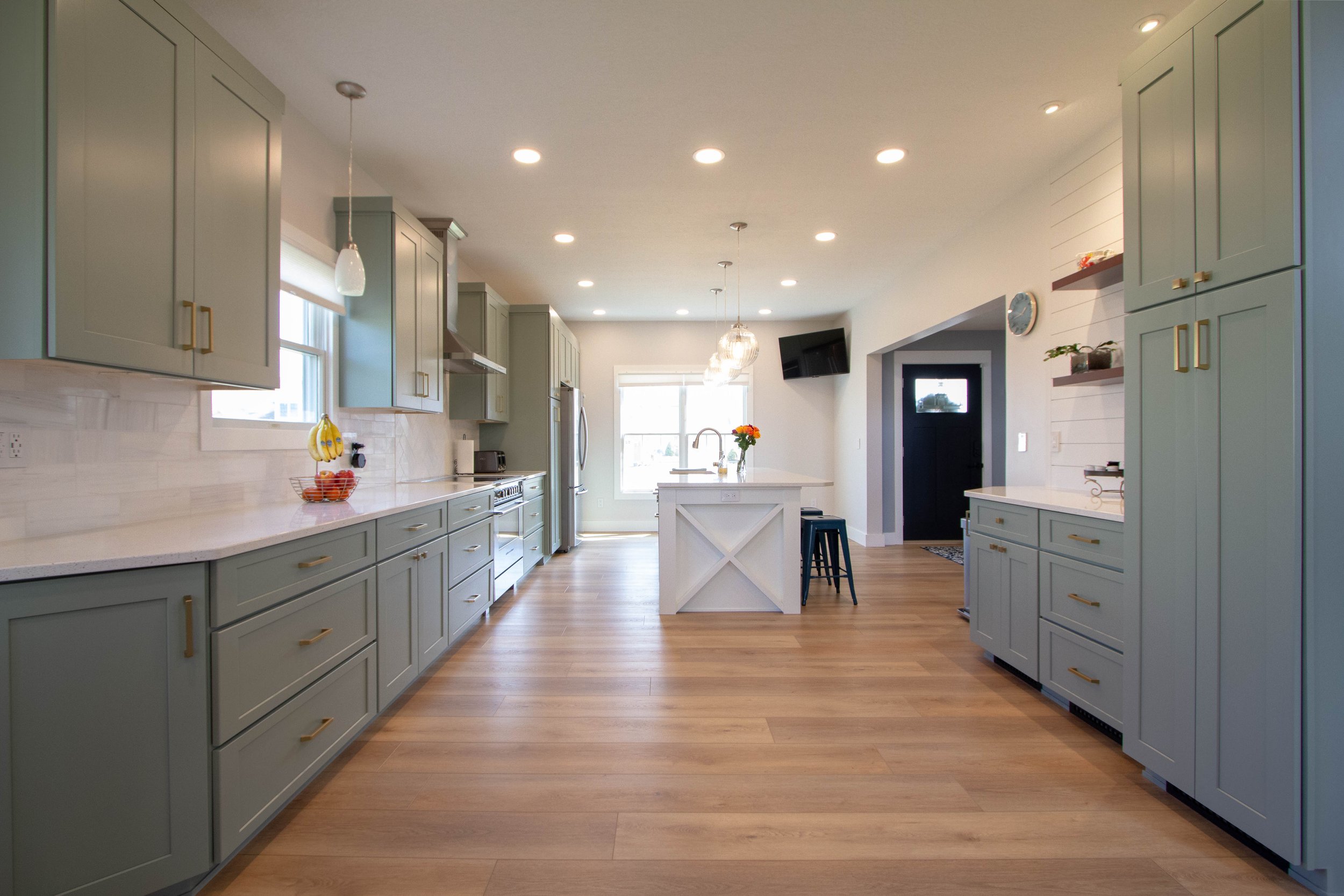 Piatt Meadows kitchen with warm cabinetry and a central island